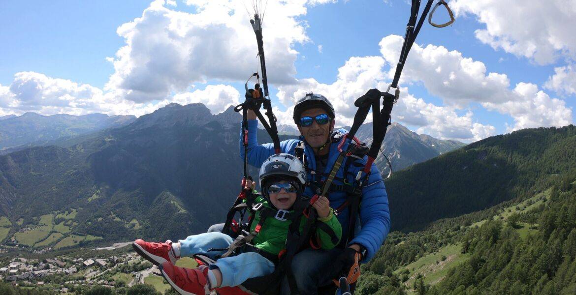 Child paragliding tandem